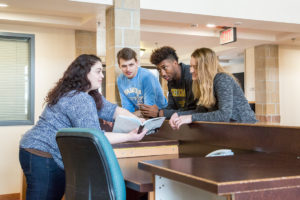 Sheridan College Student Life South Hall Discussing Front Desk