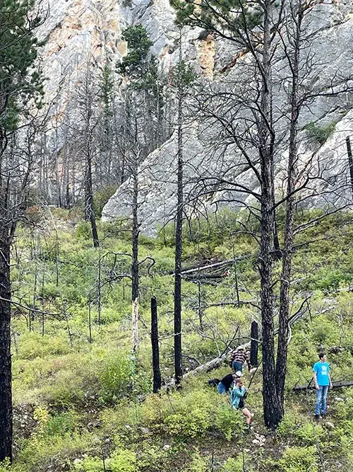 Sheridan College students by Ponderosa Pine HF Bar Ranch