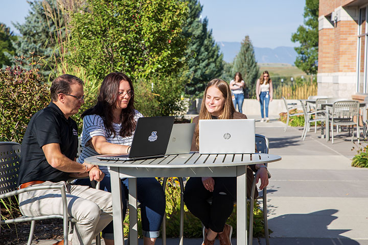 Sheridan College student with computing faculty