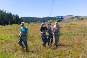 Sheridan College students fly fishing in the Bighorn Mountains
