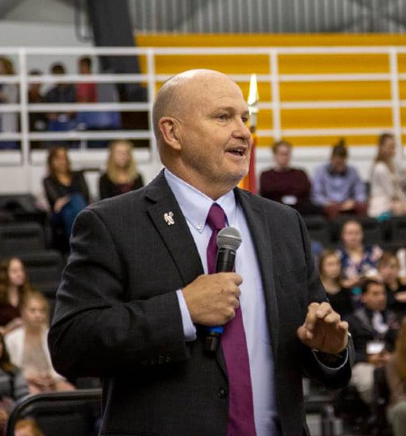 Dr. Tribley of Sheridan College speaking at an event in the Golden Dome