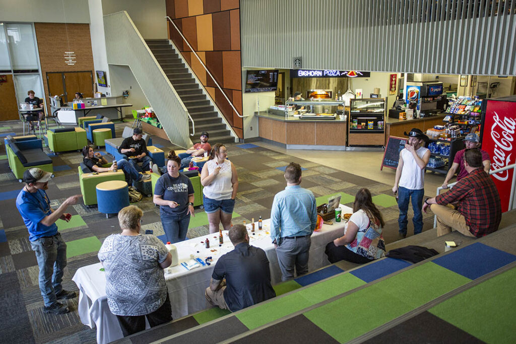 Students and staff gather for a salsa tasting activity during lunch in the Thorne Rider Campus Center