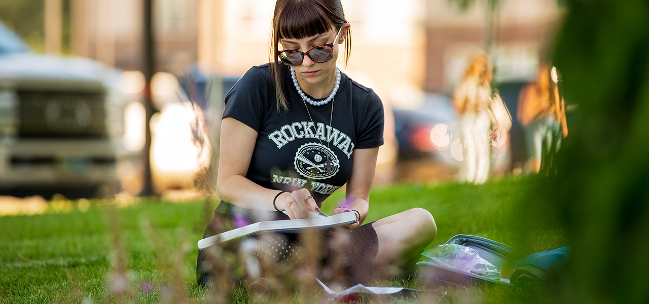 Sheridan College drawing outside on a beautiful sping day.