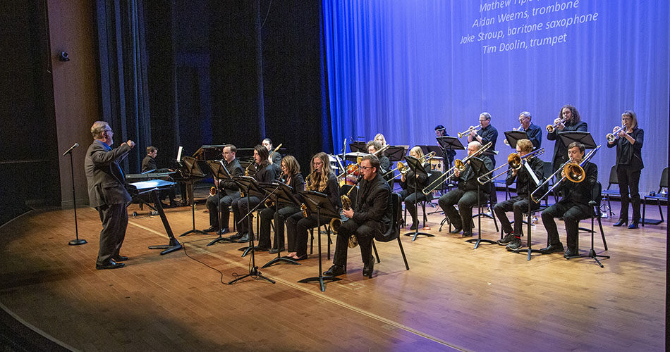 Image of the Sheridan College Jazz Ensemble Big Band performing on the Kinnison Hall Stage