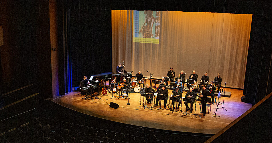 Photo of the Bighorn Jazz Orchestra performing on stage in Kinnison Hall