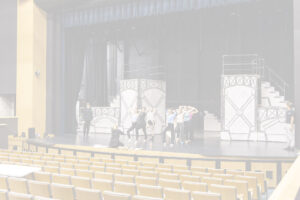 dancers on stage in Kinnison Hall