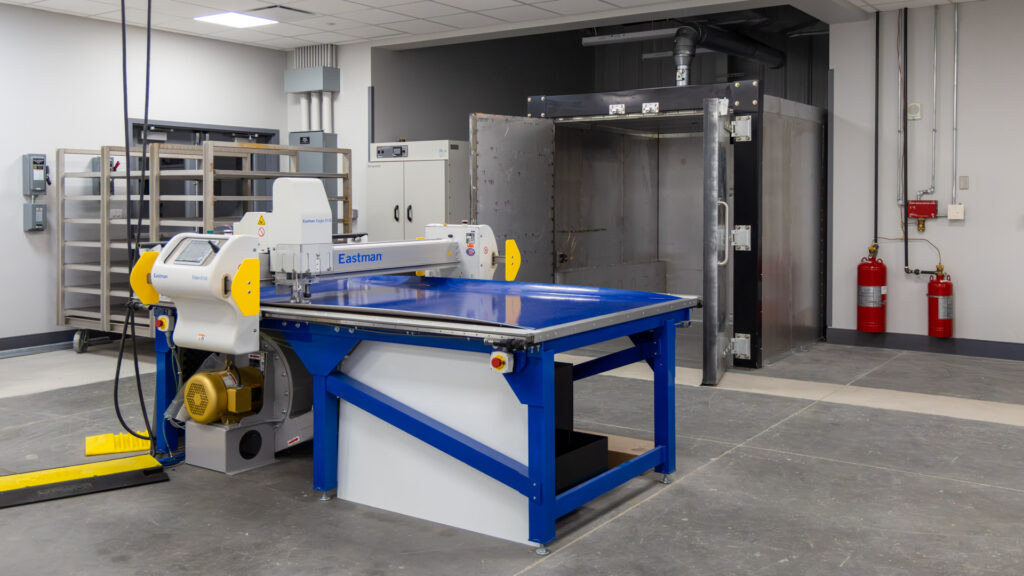 Automated digital cutting system used for precision cutting, pattern development, prototyping, composite manufacturing, and advanced material processing. 

2' × 24' Cutting Area | Up to 60 in/sec Cutting Speed | Vacuum Hold-Down System | Multi-Axis Servo Motion | Cutting, Marking, Drilling & Punching | Zoned Work Areas | Computer-Controlled Operation 