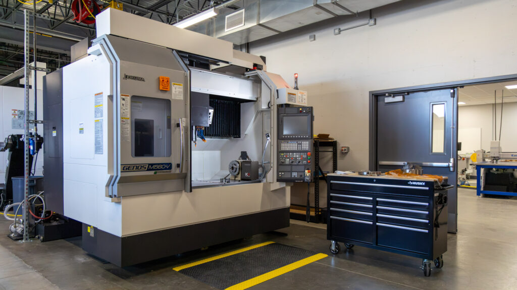 GENOS M560-V 4-Axis Simultaneous High-speed vertical machining center with large work capacity and multi-sided machining capabilities. 

51.18" × 22.05" Table | 15,000 RPM Spindle | 30/25 HP | CAT 40 BIG-PLUS® | X41.34" Y22.05" Z18.11" | 32 Tools | Renishaw Probe | RTS Tool Setter | Inspection Plus Software |OSP-P300MA Control 