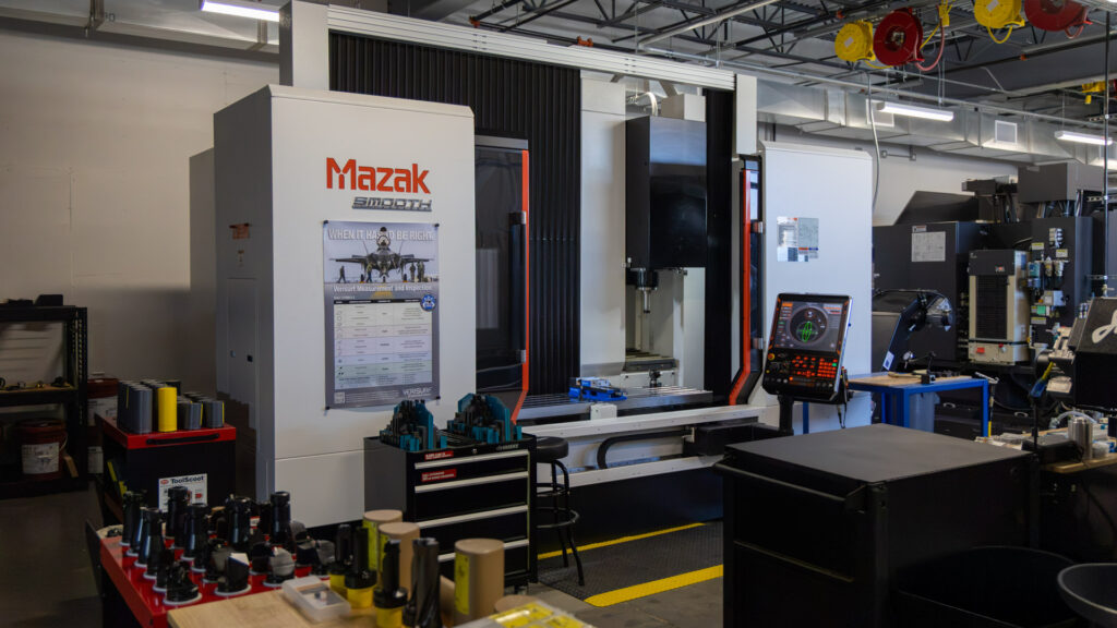 Mazak VTC-200C with 4th Axis Large-capacity vertical machining center with integrated 4th-axis capability, probing, and through-spindle coolant for precision machining of complex and oversized components. 

78.74" × 20.08" Table | 15,000 RPM Spindle | 30 HP | CAT 40 BIG-PLUS® | X65.35" Y20.08" Z25.98" | 24-Tool ATC | MR-250RAM01 4th Axis | Renishaw Probing | Through-Spindle Coolant | MAZATROL SmoothG Control 