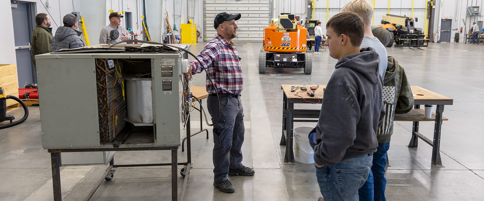 Students listen to an introduction to HVAC system.