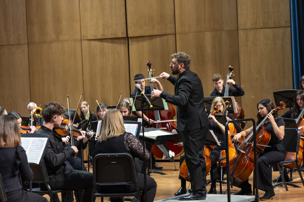 Ryan Walker conducting the Sheridan College Symphony Orchestra