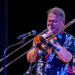 Summer Swing image of Eric Richards playing trombone