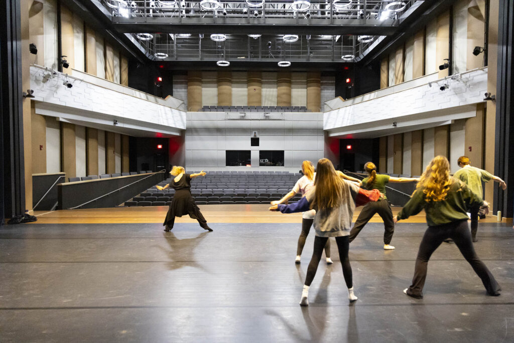 Dance students warm up in Kinnison Hall