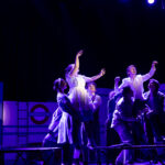 Theater students performing a production of Alice by Heart at the WYO Theater