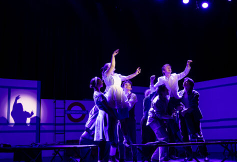 Theater students performing a production of Alice by Heart at the WYO Theater