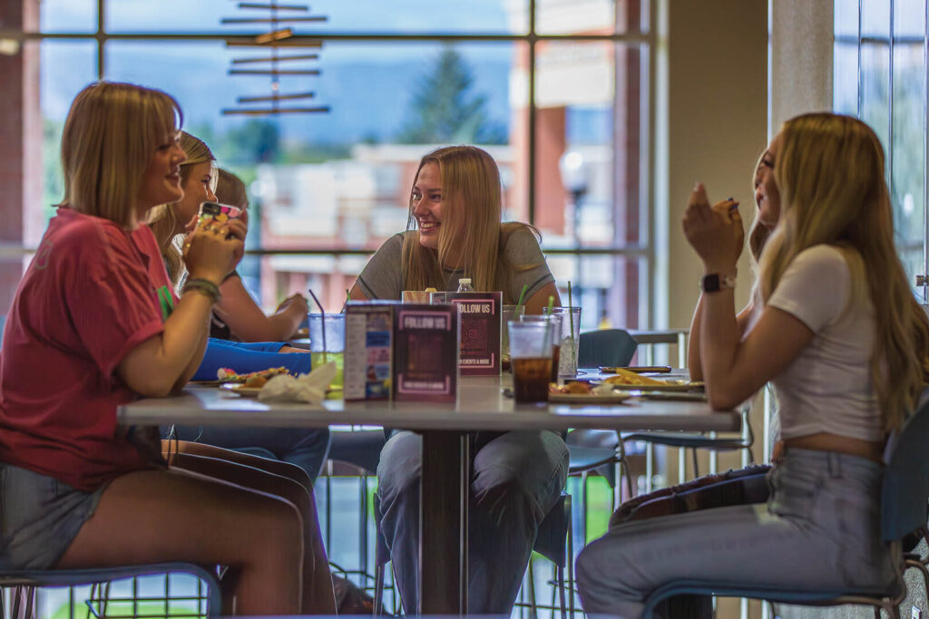 photo of students eating in the dining area at Sheridan College