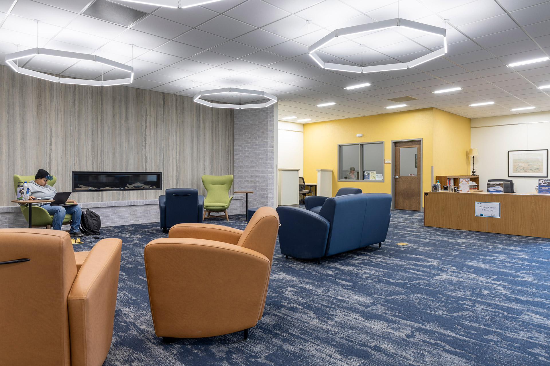 Sheridan College Kooi Library photo of fireplace and reading area.