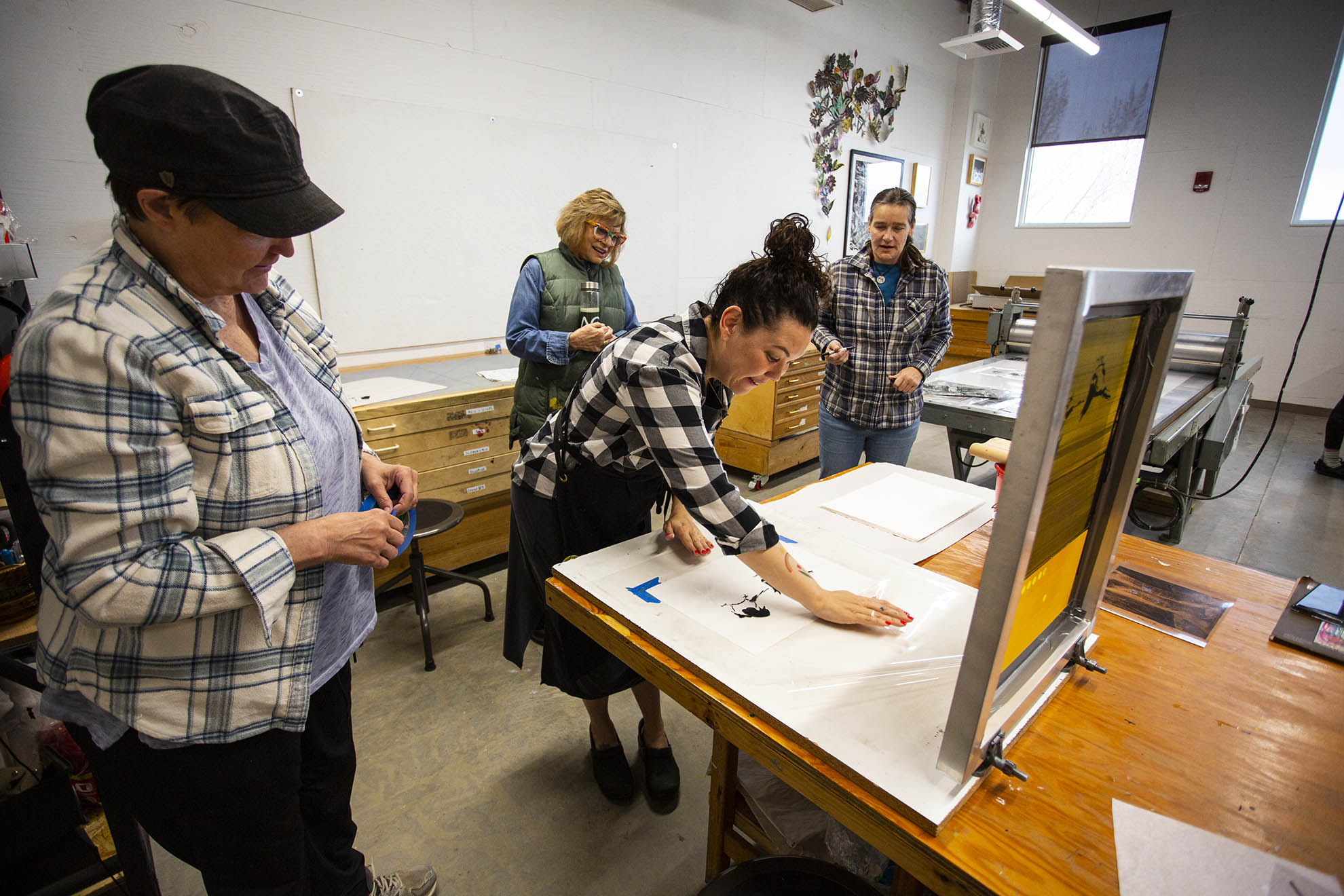 community interest class students learning about printmaking
