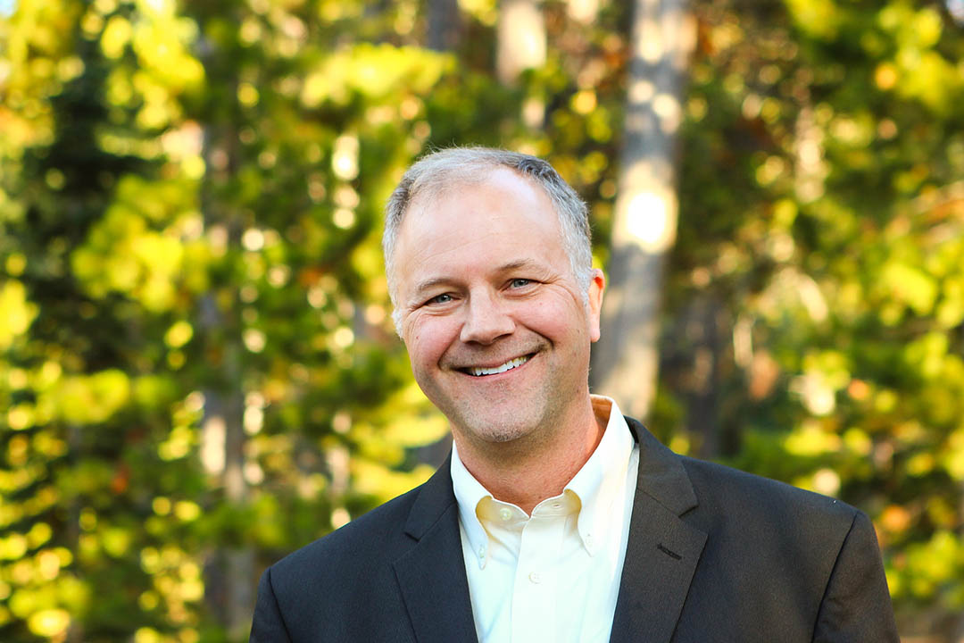 headshot photo of sam hoffman