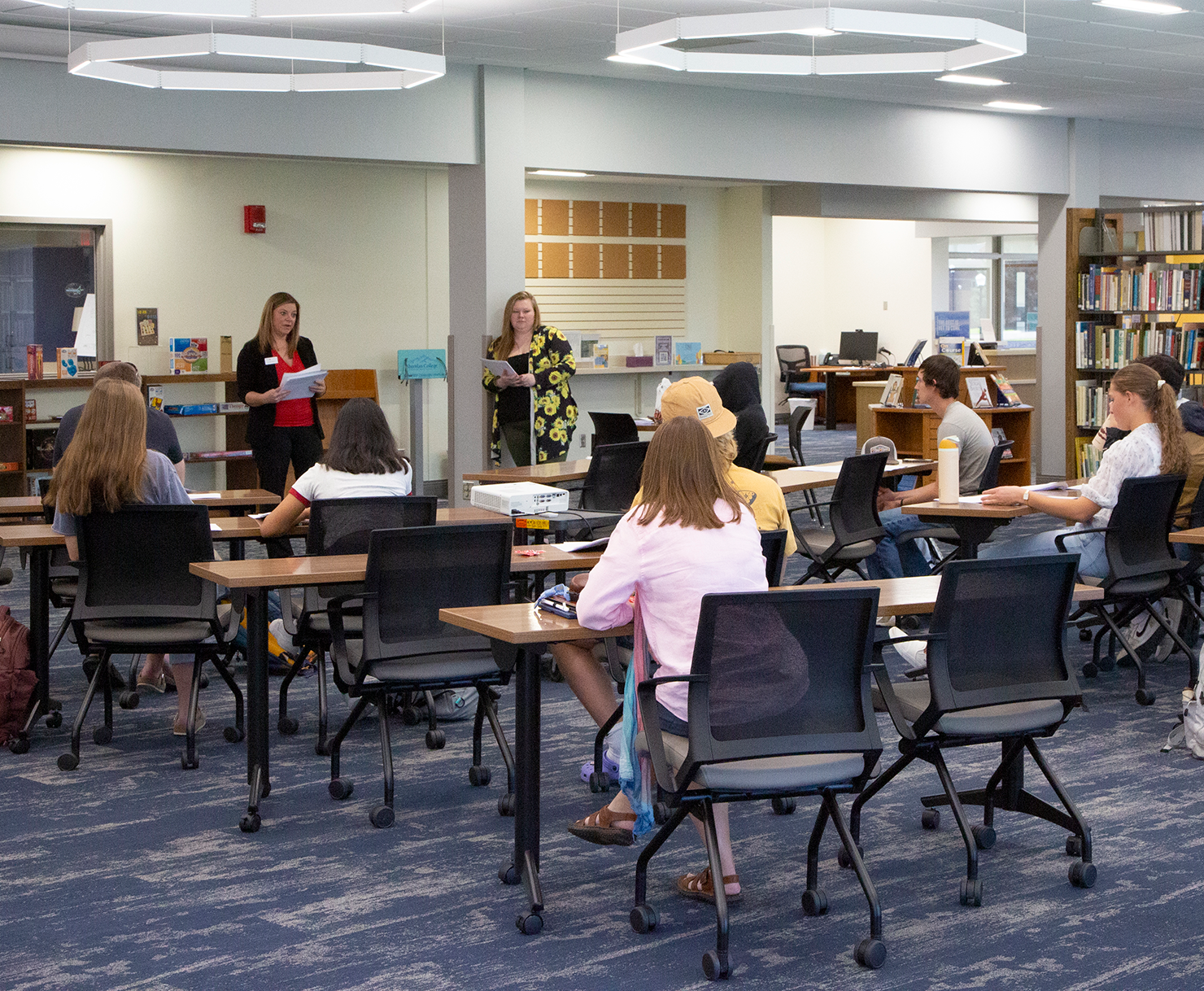 Students meet with industry leaders to learn more about how their businesses run.