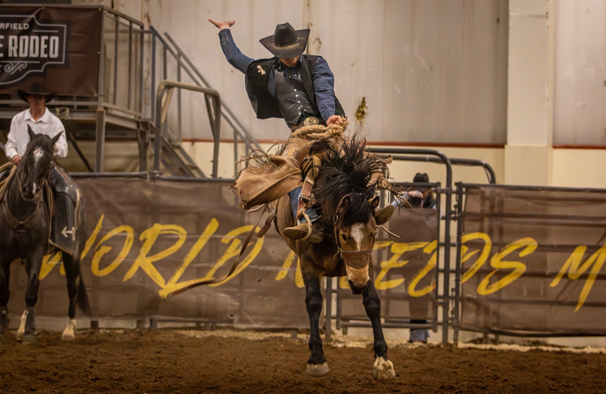 Jake Schlattman, saddle bronc regional champion competing in Laramie