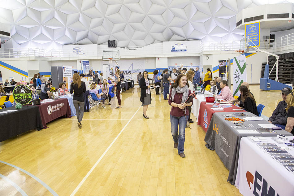 Career Fair at Sheridan College, lots of tables and people inside the dome