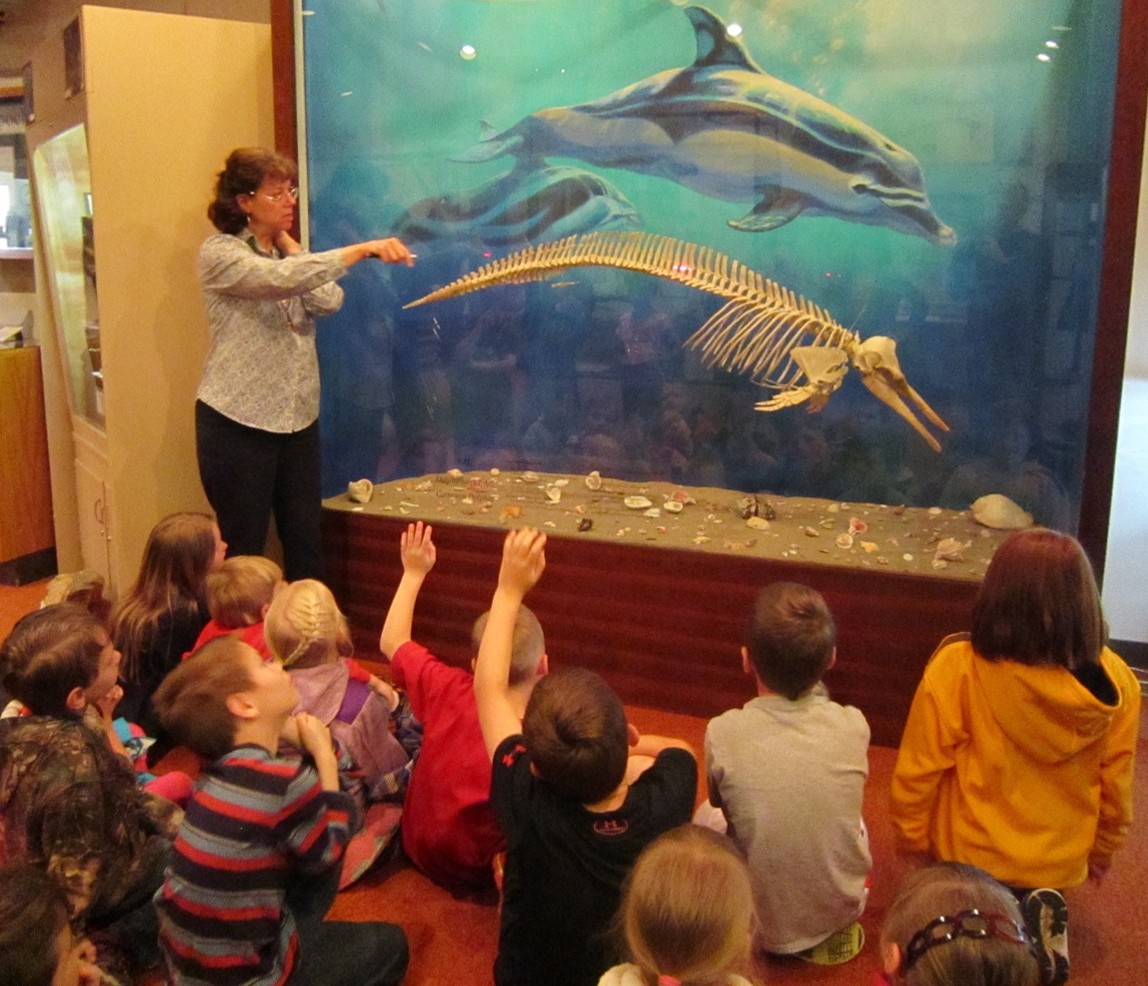Image showing Sheila Flynn with a group of school kids