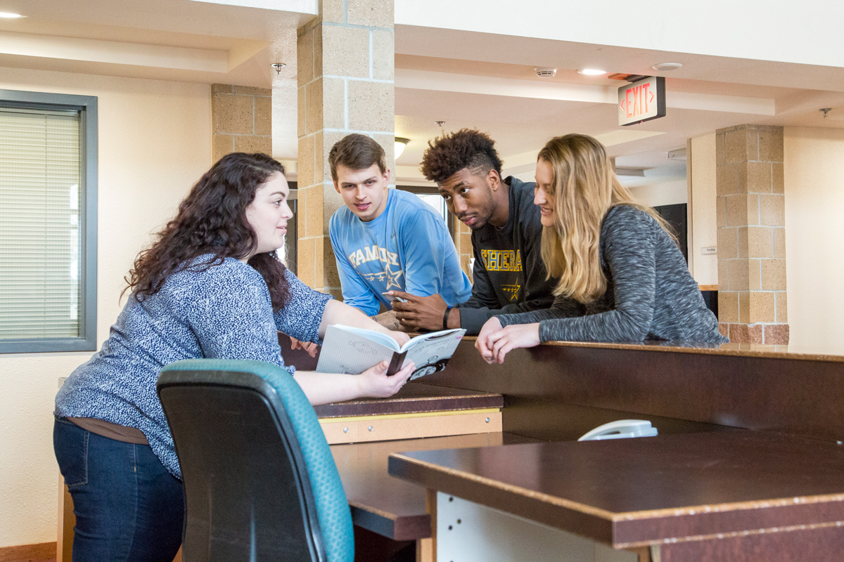 Sheridan College Student Life South Hall Discussing Front Desk Nwccd